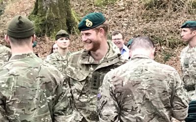 The HRH Duke of Sussex giving out green berets to new Royal Marines at Bickleigh