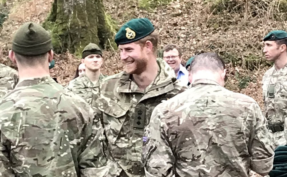 The HRH Duke of Sussex giving out green berets to new Royal Marines at Bickleigh