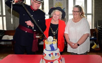 Deputy Lieutenant Nick Powe Cutting Brixham’s Coronation Cake